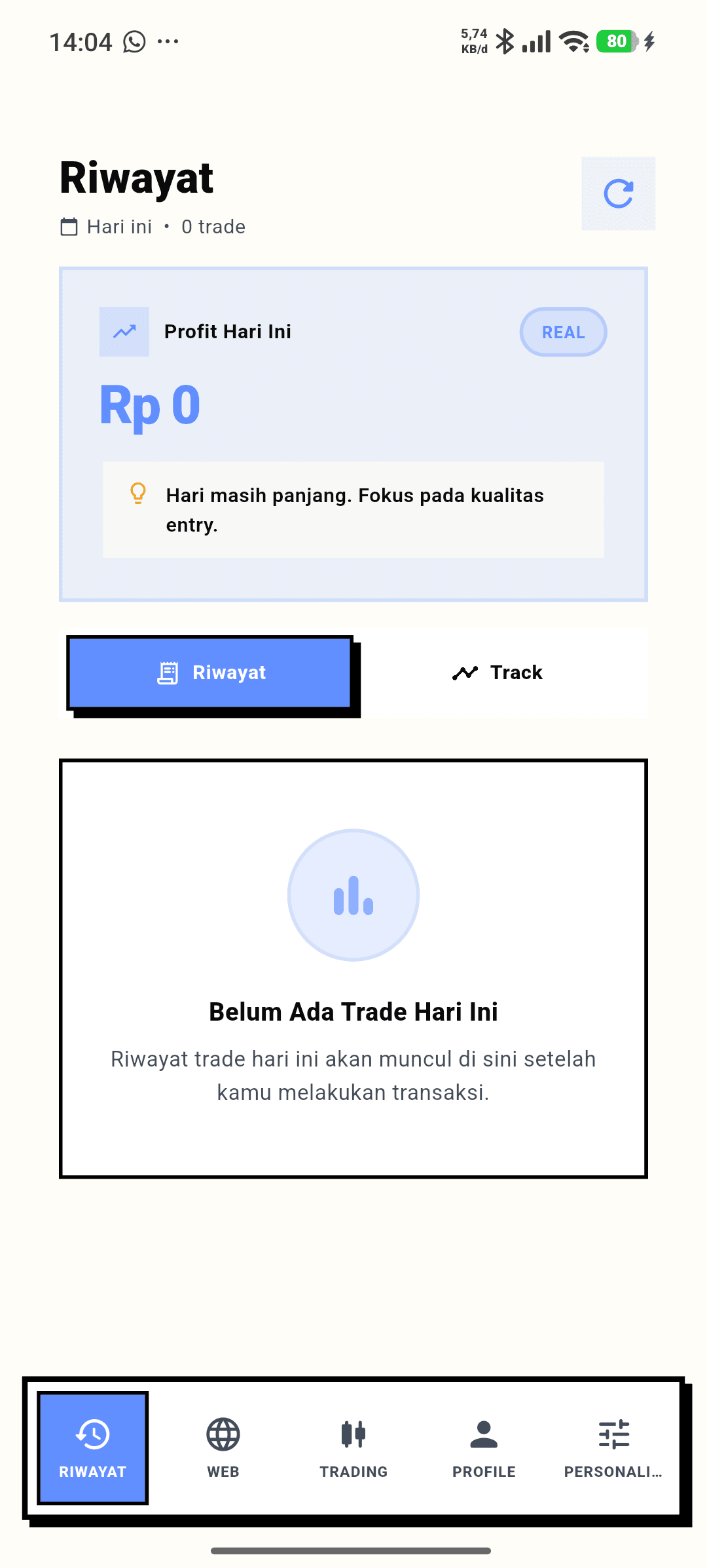 Layar Riwayat Qwantis dengan profit hari ini dan tab Riwayat serta Track